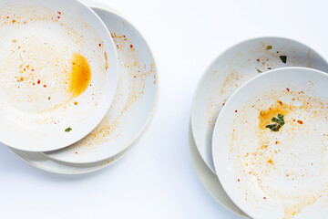 Dirty dishes on white background.