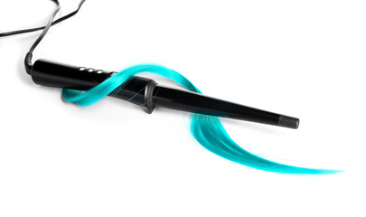 Curling iron with hair strand on white background