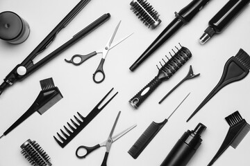 Set of hairdresser's tools on grey background