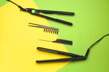 Set of hairdresser's tools on color background