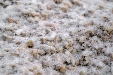 Snow covered decorative dtone aggregate chippings pebbles