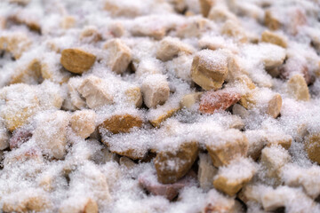 Snow covered decorative dtone aggregate chippings pebbles