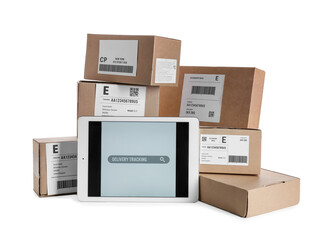 Tablet computer with open page of delivery service application and parcels on white background
