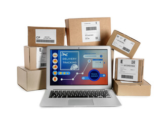 Laptop with open page of delivery service application and parcels on white background