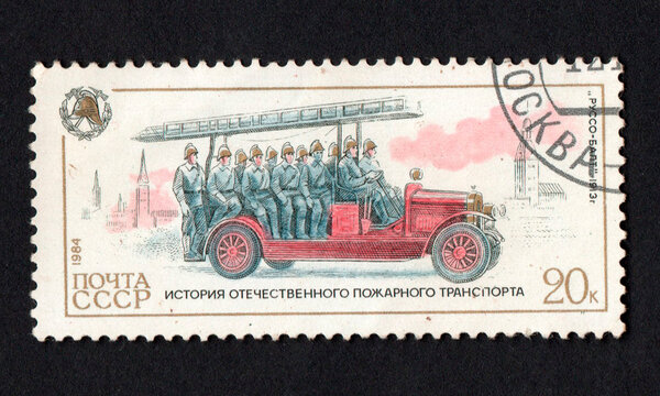 Stamp dedicated to historic fire engine. History of fire fighting equipment