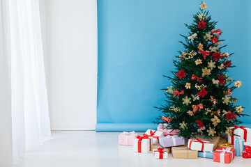 Christmas tree with gifts interior decor for the new year