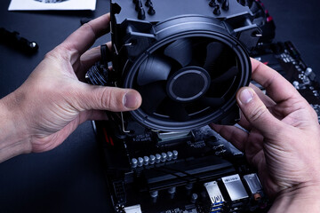Installing or repair the air cooling system of the personal computer processor.