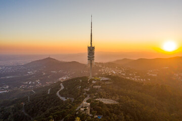 Obraz premium Radio tower on top of Mount Tibidabo near Barcelona during sunset