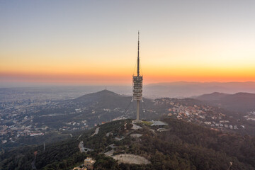 Radio tower on top of Mount Tibidabo near Barcelona during sunset