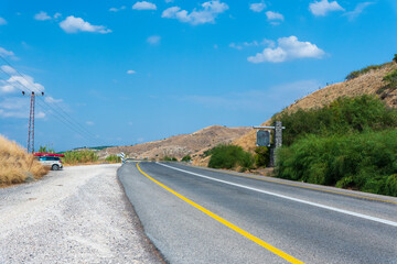 Summer day landscape with a winding road, The road to the Sea of Galilee, Israel, High quality photo