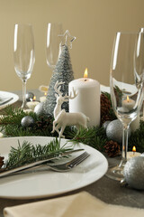 Concept of romantic New year table setting on gray table
