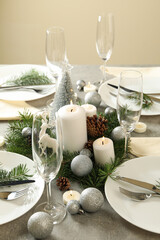 Concept of romantic New year table setting on gray table