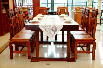 Traditional furniture made of red wood, dining table