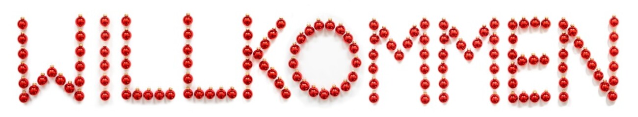 Red Christmas Ball Ornament Building German Word Willkommen Means Welcome. Festive Christmas Decoration. White Isolated Background