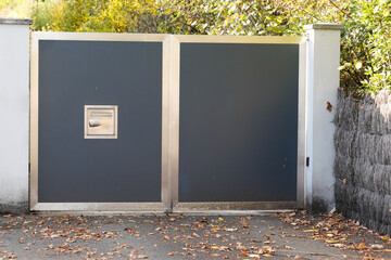 Aluminum steel chrome home silver grey gate portal of suburb house