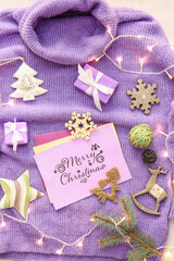 Beautiful greeting card for Christmas celebration, gifts and sweater with decor, top view