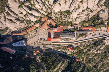Aerial overhead drone view of Abbey of Montserrat near Barcelona in morning sunrise