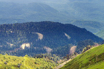 Chairlift in a mountain region in summer. Life of ski resort in summertime