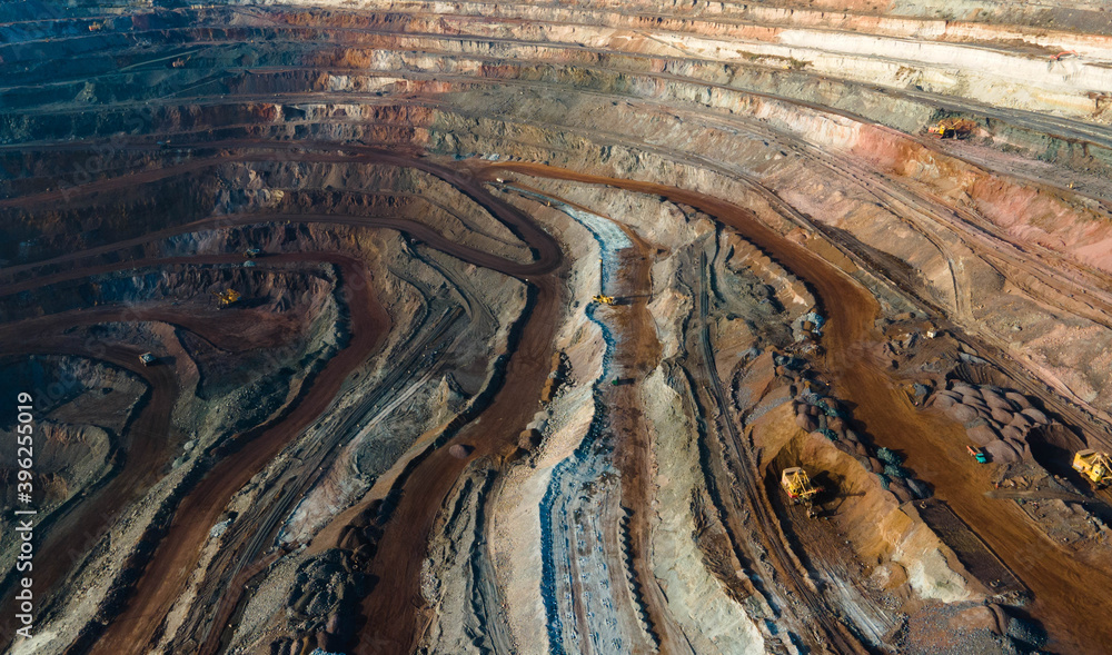 Wall mural Huge iron ore quarry iron ore quarry top view Aero photo shoot.