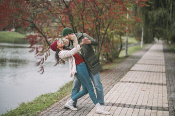 Fototapeta premium Couple dancing while having a date outdoor