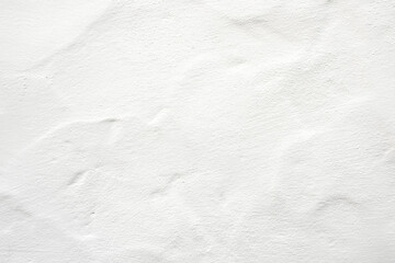 detail of white plaster wall