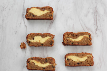 Top View Sliced Banana Bread (Banana Cake) with Cream Cheese Filling with Copy Space