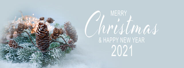 Merry Christmas and Happy New Year 2021 greeting card - xmas background banner with pine cone in...
