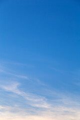 Vertical image white clouds in the blue sky