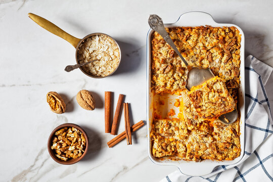 Pumpkin Dump Cake With Ingredients On A Marble