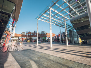 Almere city center square (Forum) during the day, almost empty due to a partial COVID-19 lockdown in November 2020. Wide angle shot.
