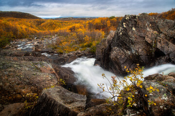 Waterfall in tundra region - 396273893