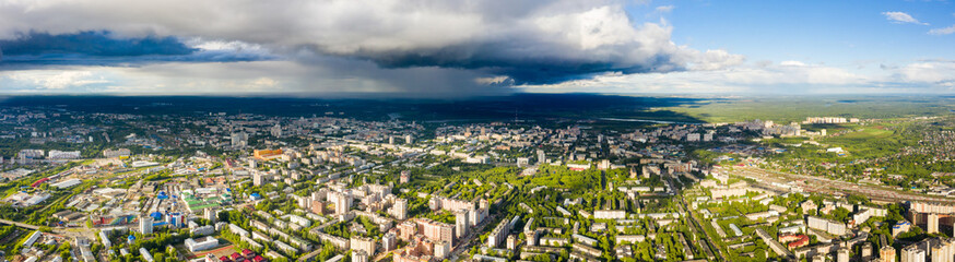 Panorama of the Kirov city and pioneer palace in Leninsky district in the central part of the city of Kirov on a summer day against the backdrop of thunderstorms and storms.