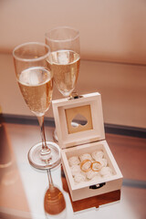 Champagne glasses and ring box