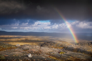 rainbow over the tundra - 396275087