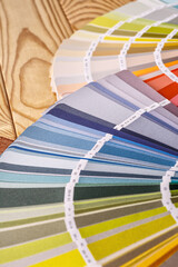 Close-up on color palette guide for printing and painting. Concept - choice of colors for design.