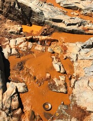 Artisanal gold mining near Antsirabe, Madagascar. Panners wash extracted soil as they pan for gold....