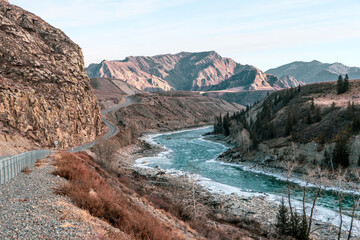 Chuysky tract is the main road in Altai mountains and the river. Beautiful winter landscape.