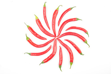 Red hot chili peppers on a white background. food figures. Vitamin vegetable food