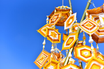 Hanging handmade hexagonal colorful knitting yarn flags. Colorful drape, Blown in the traditional...