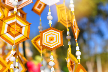 Hanging handmade hexagonal colorful knitting yarn flags. Colorful drape, Blown in the traditional...