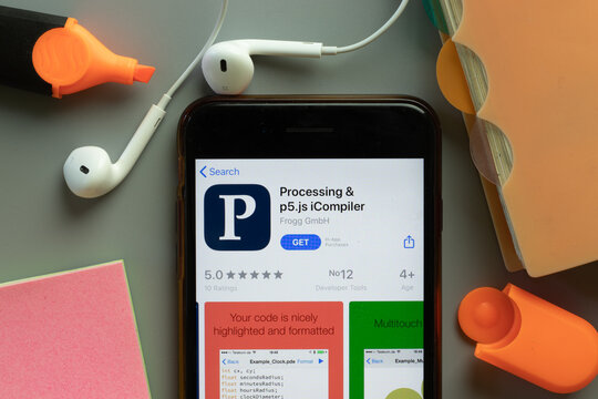 New York, USA - 1 December 2020: Processing p5.js iCompiler mobile app icon on phone screen top view, Illustrative Editorial