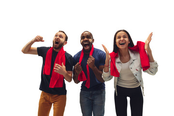 Celebration. Multiethnic soccer fans cheering for favourite team with bright emotions isolated on white background. Beautiful caucasian women look excited, supporting. Concept of sport, fun, support.