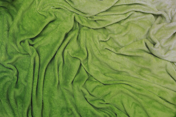 Green soft wrinkled plush, draped velour background with drapery