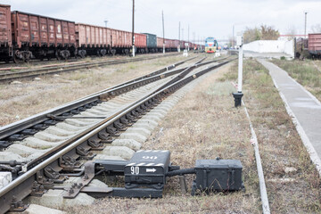 Railway on the background of trains. Rails and sleepers