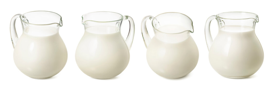 Set Of Milk Jars Isolated On White Background. Glass Pitchers For Dairy Products