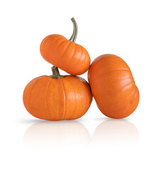 Orange pumpkins on white background. Three orange pumpkins isolated on white background