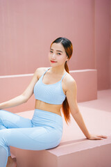 Beautiful sporty woman wearing sport bra in natural light.