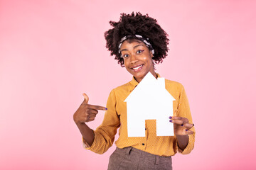 Insurance, loan, real estate and family concept. Smiling black woman buying home, holding paper...