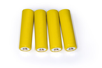 Rechargeable AA batteries on light surface, top view