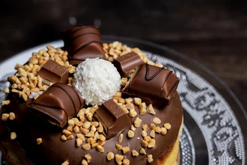 Foto op Aluminium Chocolate candy bar doughnut with peanuts © Kamila